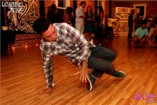 Dancer performs during the First Friday opening of the Loading Zone